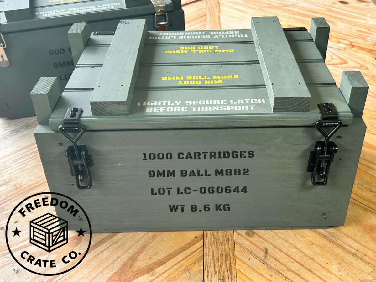 Caliber Collection 9mm ammo crate with black hardware and Freedom Crate Co. logo