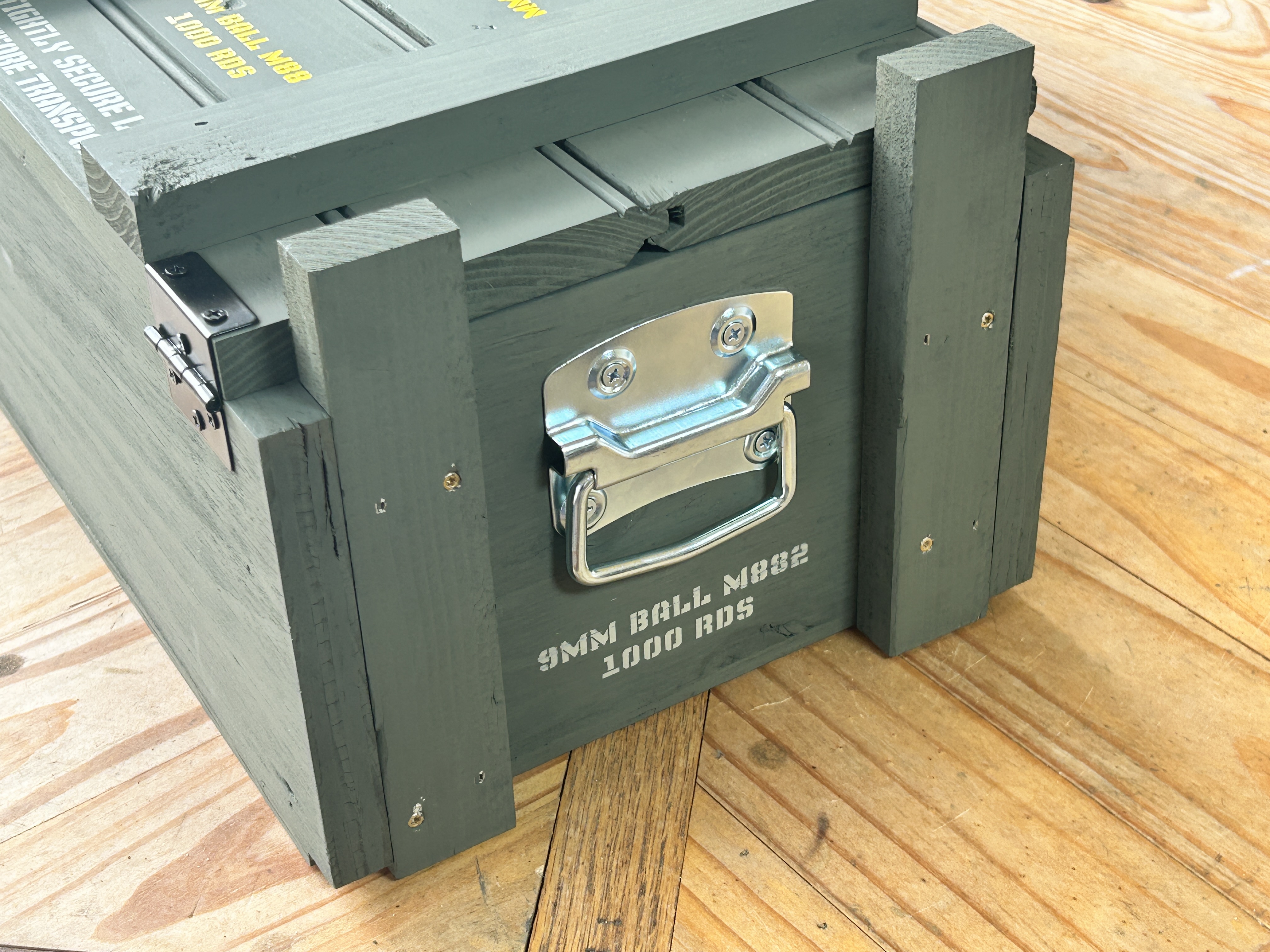 Side handle detail on 9mm wooden ammo crate