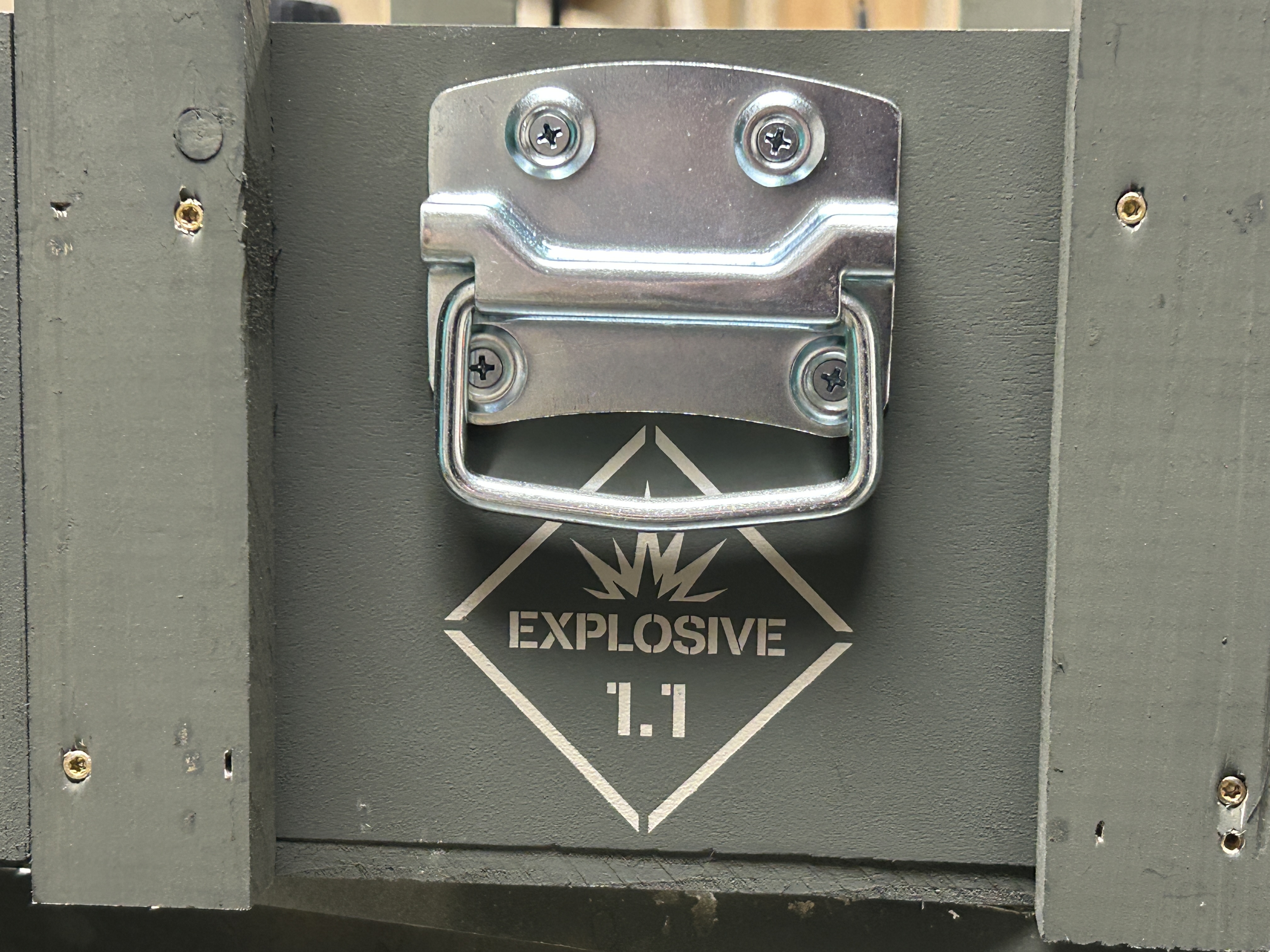 Second side handle and explosive marking detail on Claymore Field Crate Standard Edition