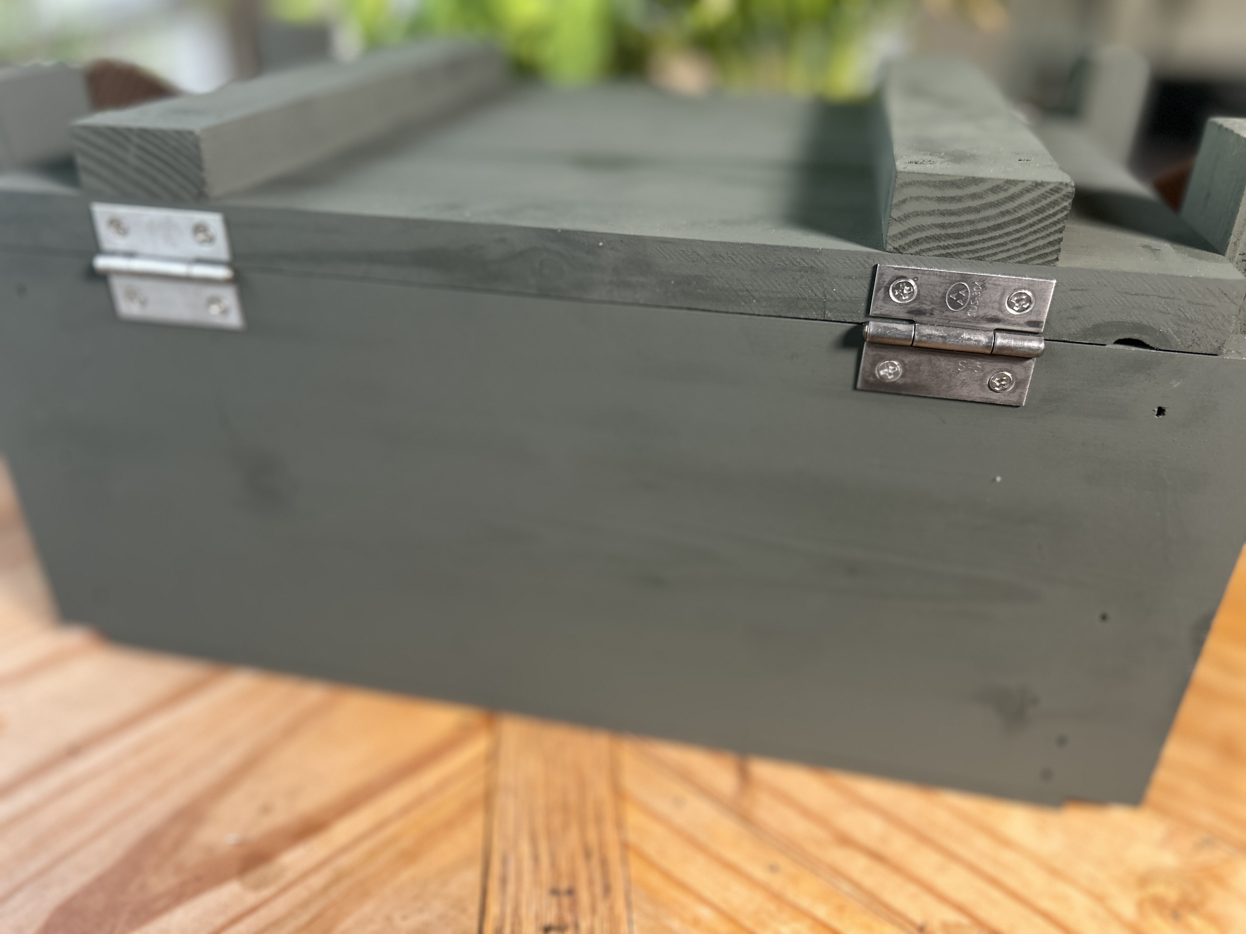 Rear hinge view of U.S. Army wooden ammo box