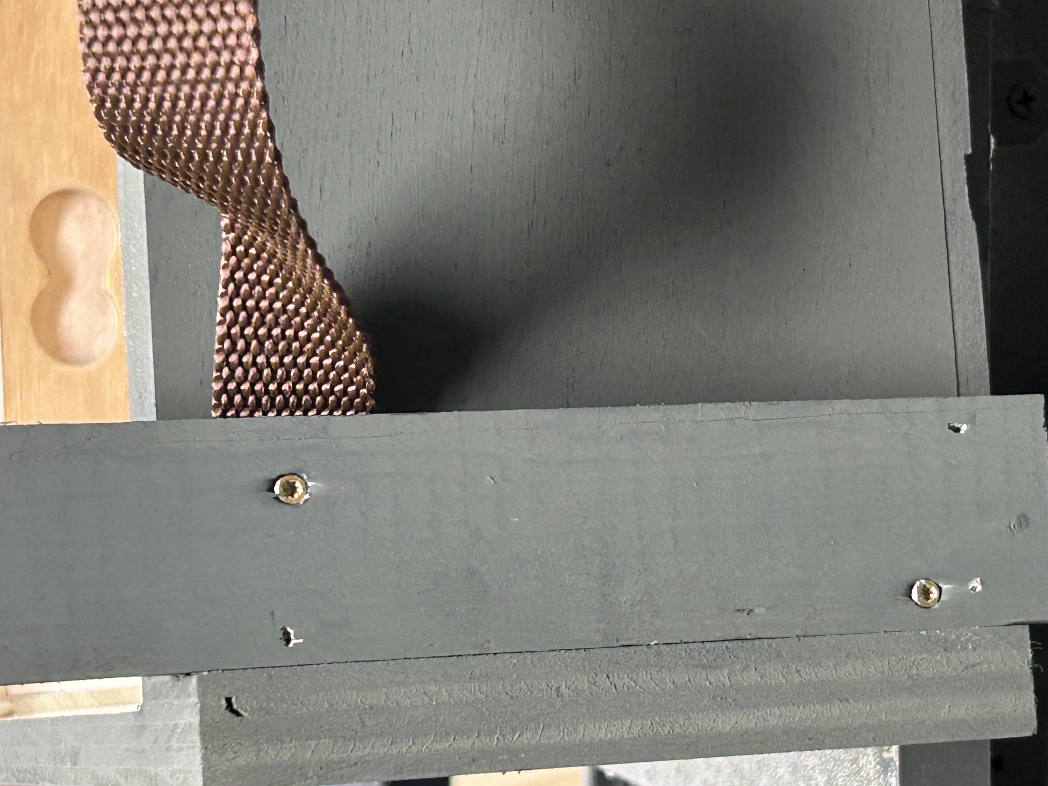 Leg fully installed over enclosed nylon handle screw