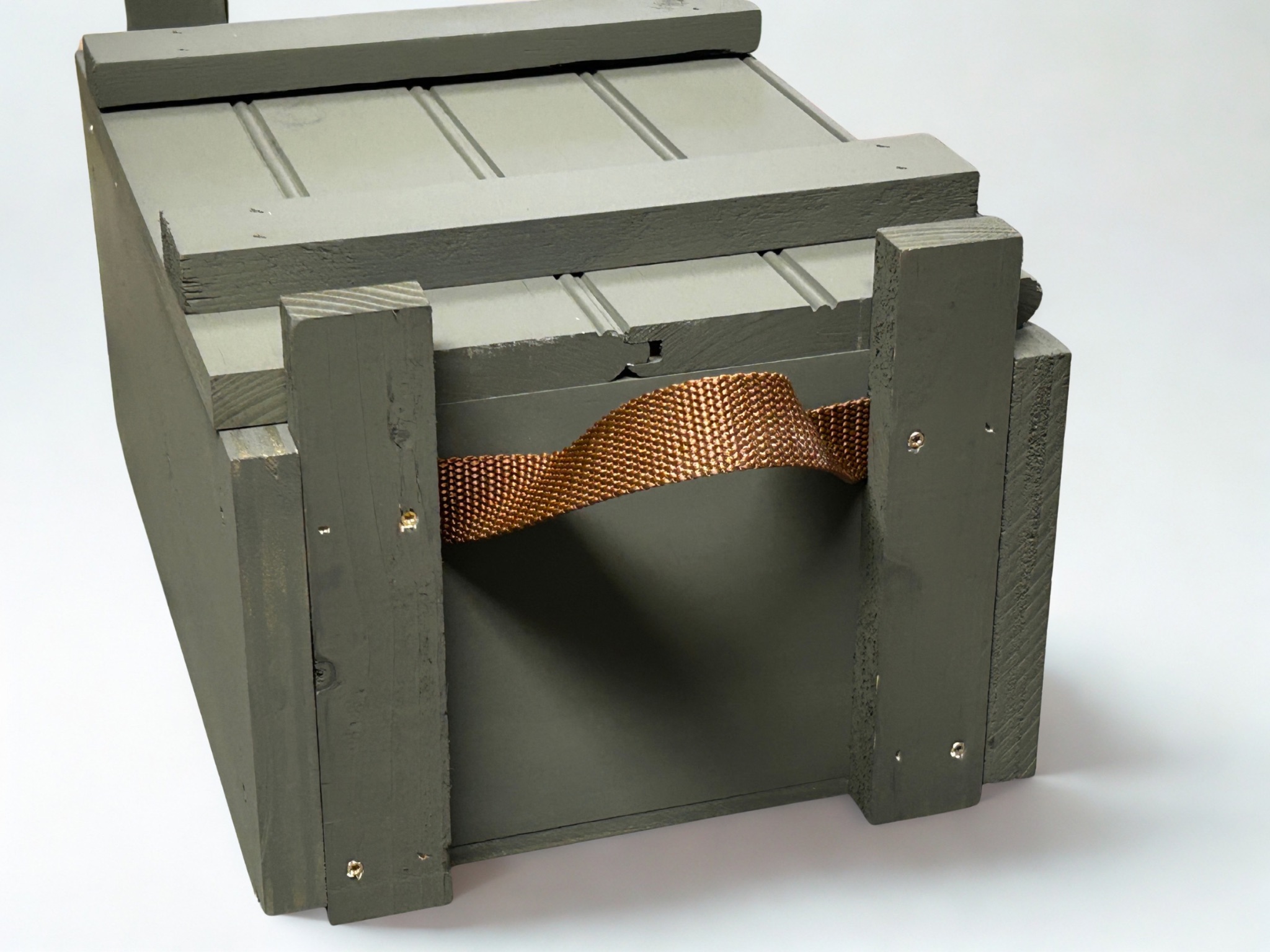 Traditional slide top ammo crate side view with nylon webbing handles