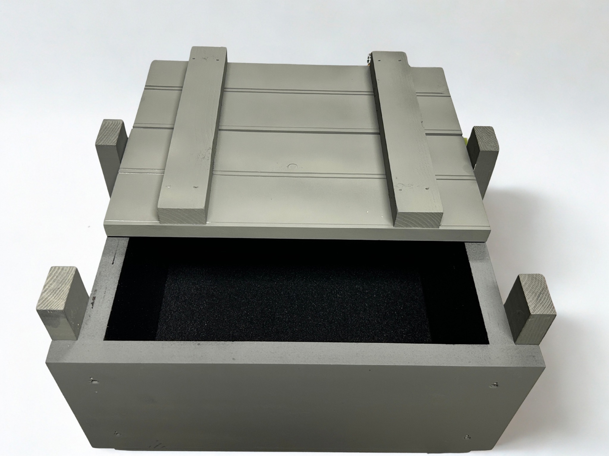 Traditional slide top ammo crate steel handle front view